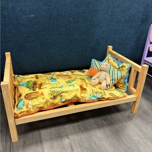 Wood bed frame with fun cushions for dolls